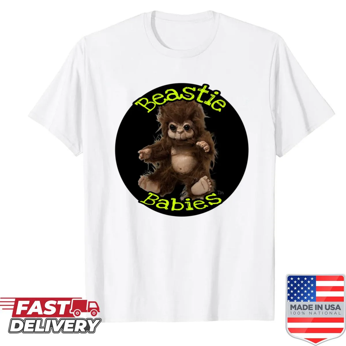 Cartoon image of a baby Bigfoot on a brown shirt.