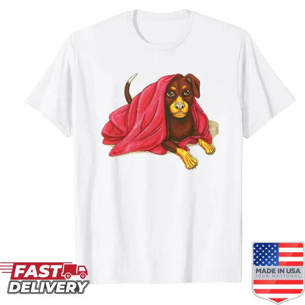 Illustrative dog wrapped in a blanket on a comfortable shirt