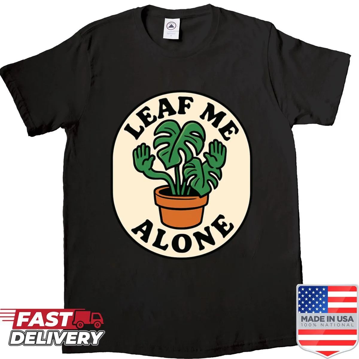 Oversized shirt with a funny plant lover design saying 'Leaf Me Alone'