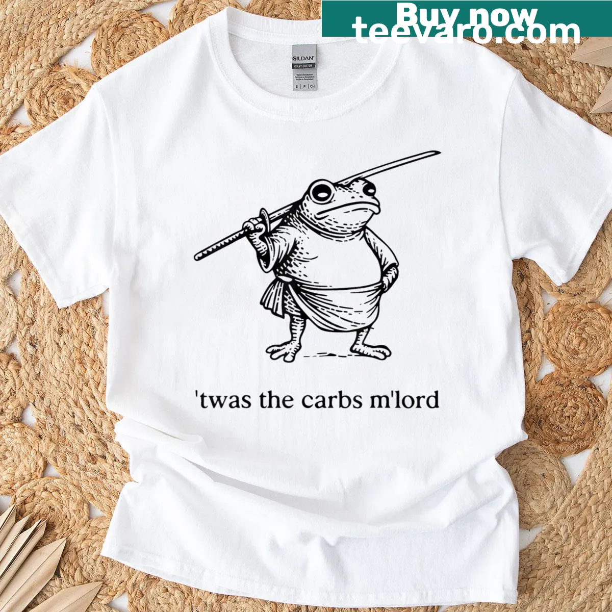 Illustrative t-shirt featuring frogs in medieval attire — on a men's t-shirt