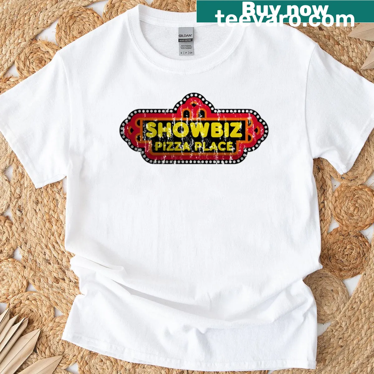Vintage Showbiz Pizza Place graphic T-shirt — on a men's t-shirt