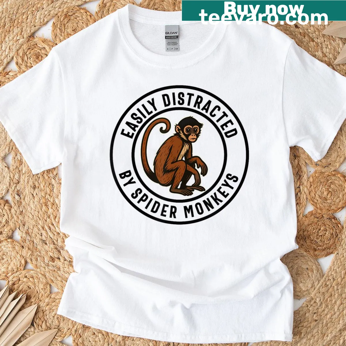 Funny Spider Monkey t-shirt with playful cartoon design — on a men's t-shirt