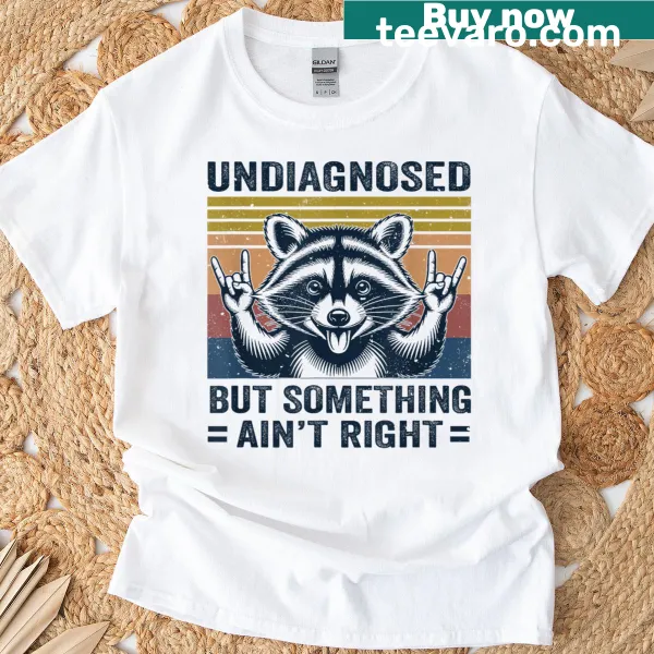 Funny raccoon meme t-shirt with cartoon raccoon and humorous text