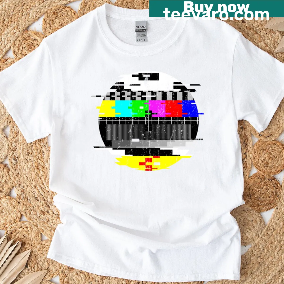 Vintage t-shirt with a glitched TV test pattern graphic design. — on a men's t-shirt