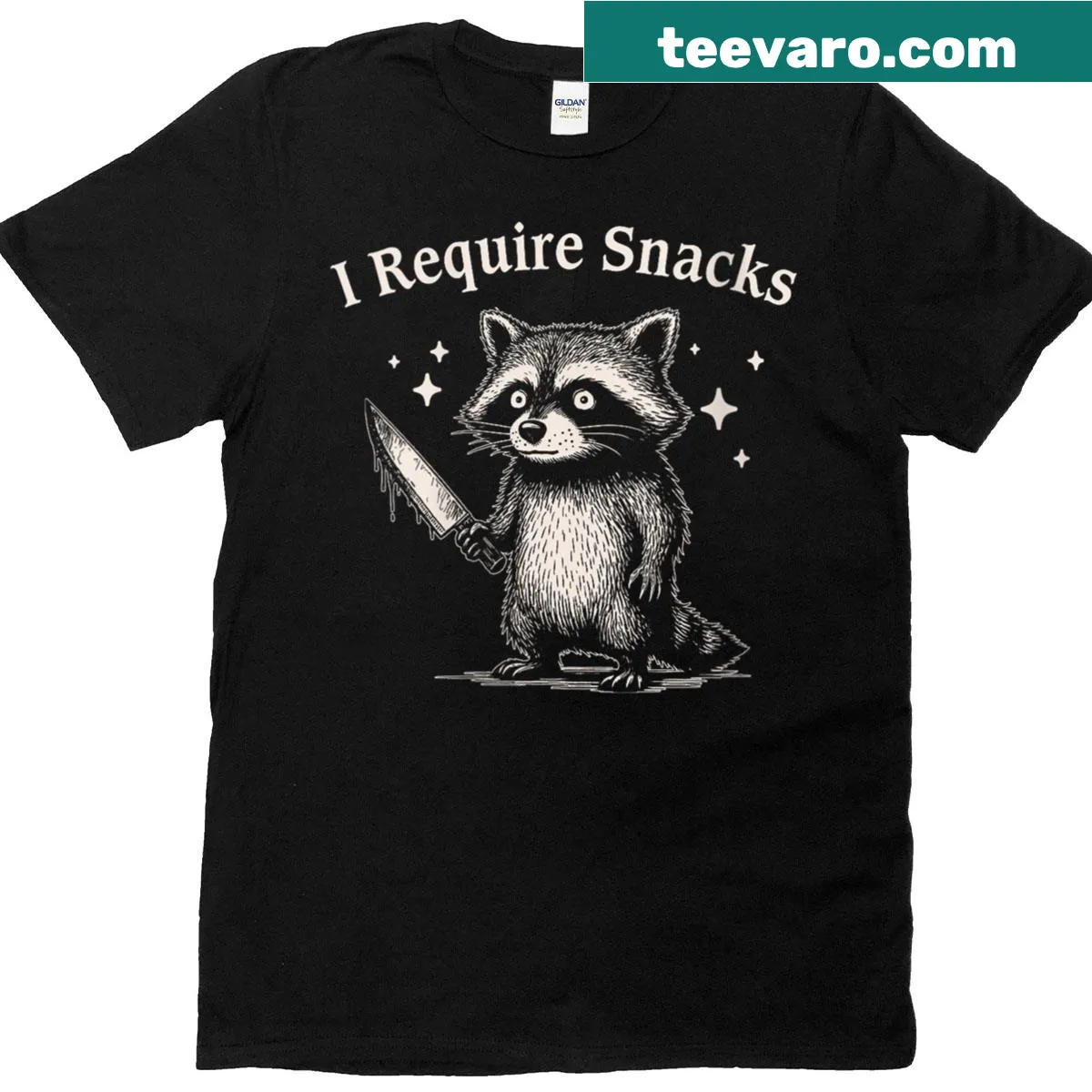 Funny T-shirt with a cartoon raccoon saying I Require Snacks — on a men's t-shirt