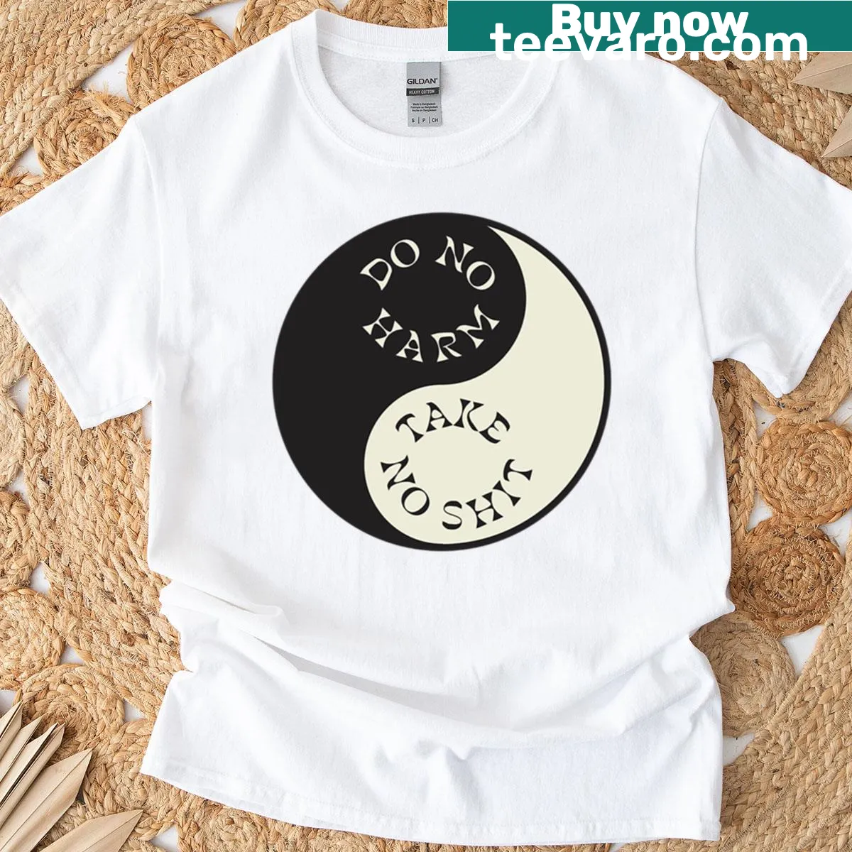 Vintage Yin Yang graphic on a minimalist T-shirt — on a men's t-shirt