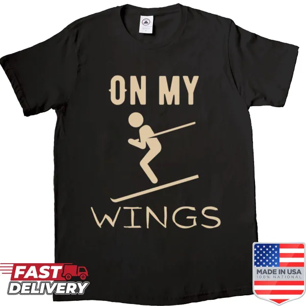 Playful ski-themed shirt with ski wings graphic