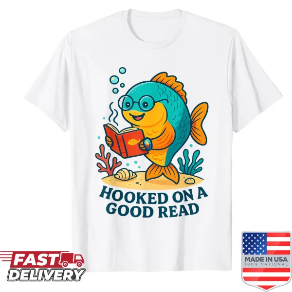 Cartoon fish with glasses reading a book on a humorous shirt