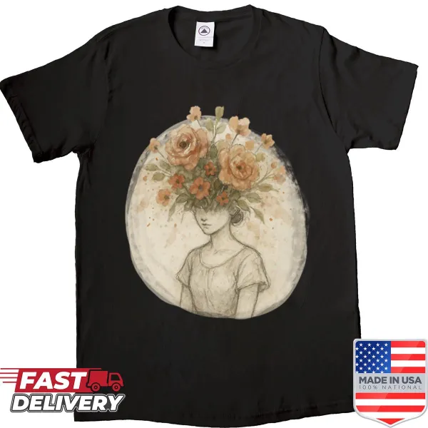 Shirt featuring a woman with a flower head illustration.