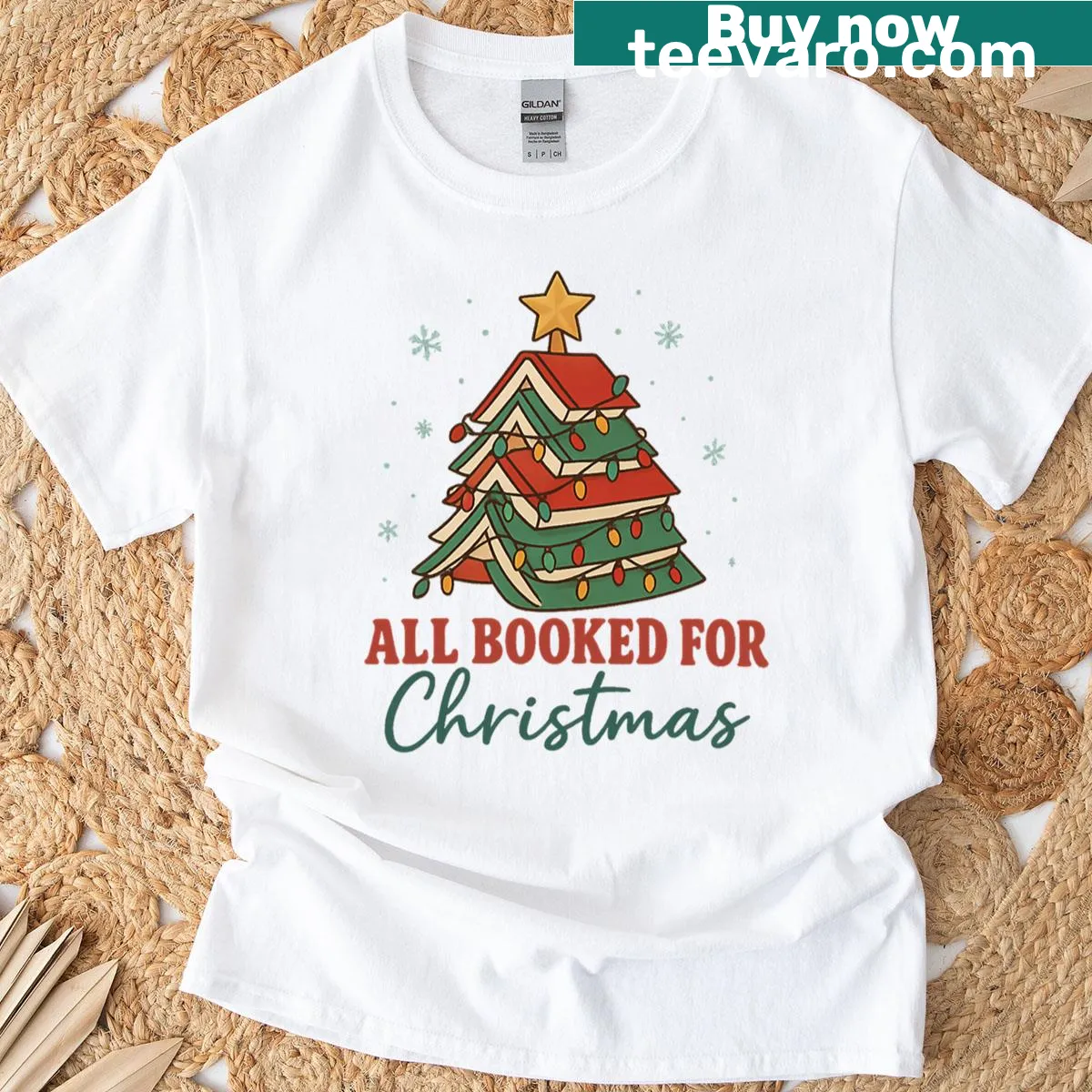 Funny Christmas-themed t-shirt for book lovers with playful graphics — on a men's t-shirt