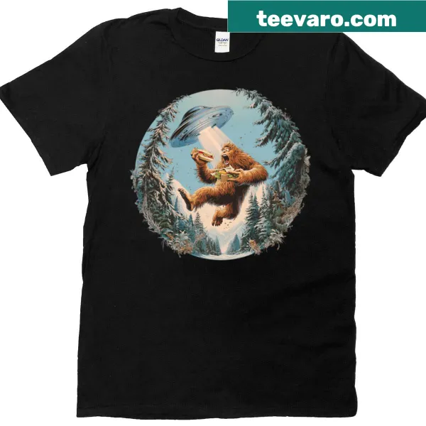 Cartoon graphic of Bigfoot being beamed up on a T-shirt