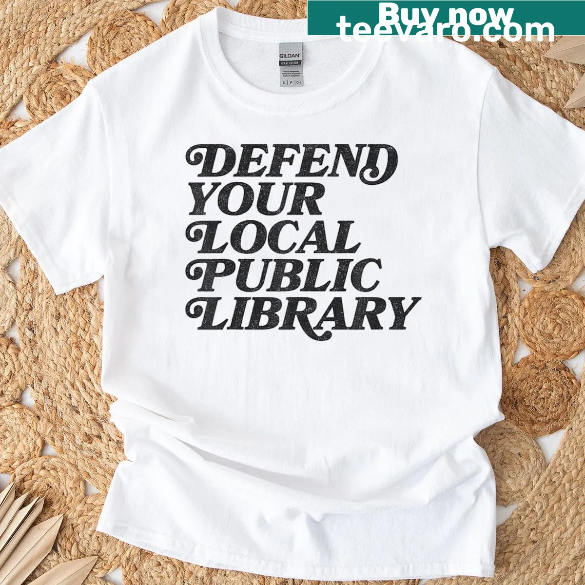 T-shirt featuring a graphic about defending local libraries — on a men's t-shirt