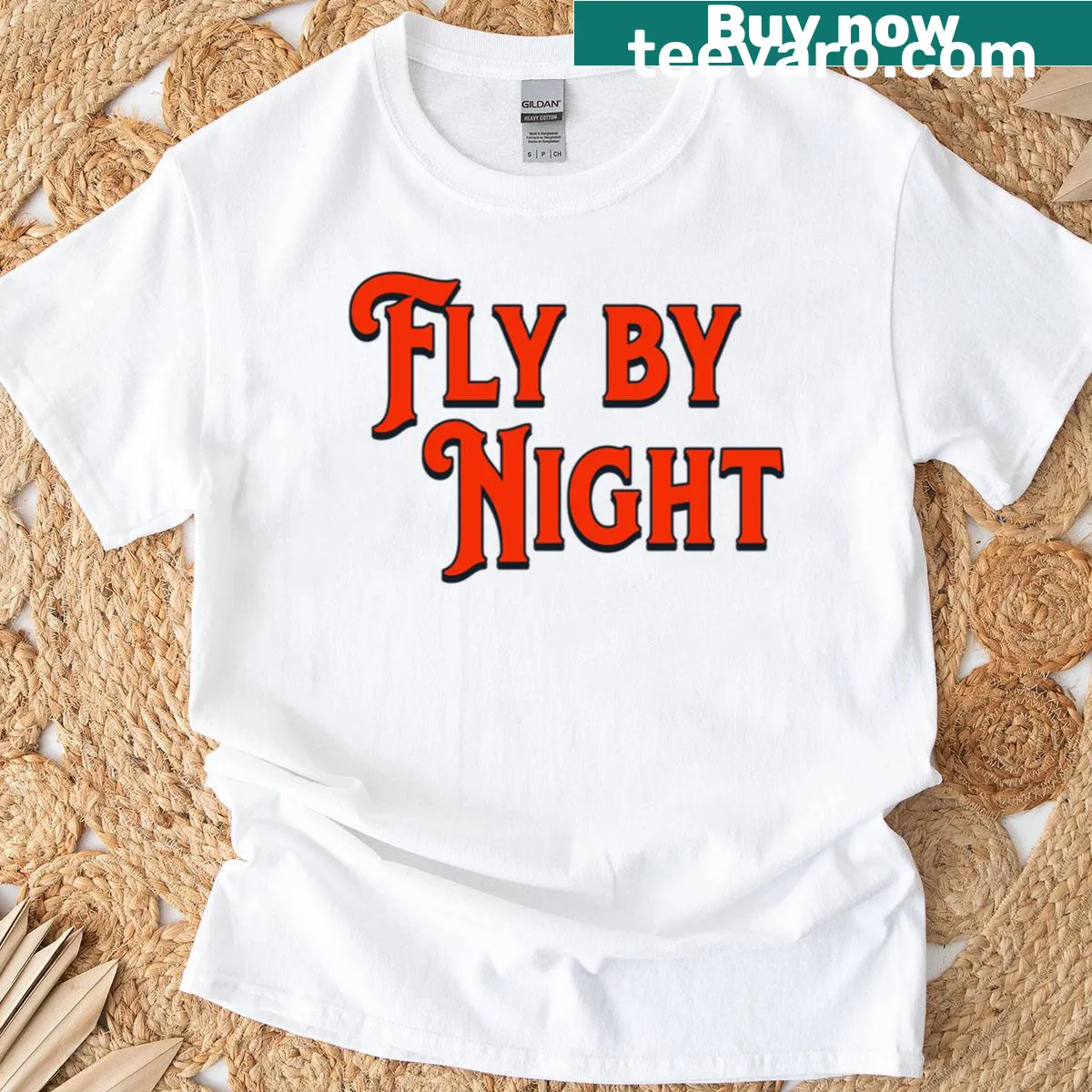Bold text design 'Fly By Night Rush' on an oversized T-shirt — on a men's t-shirt