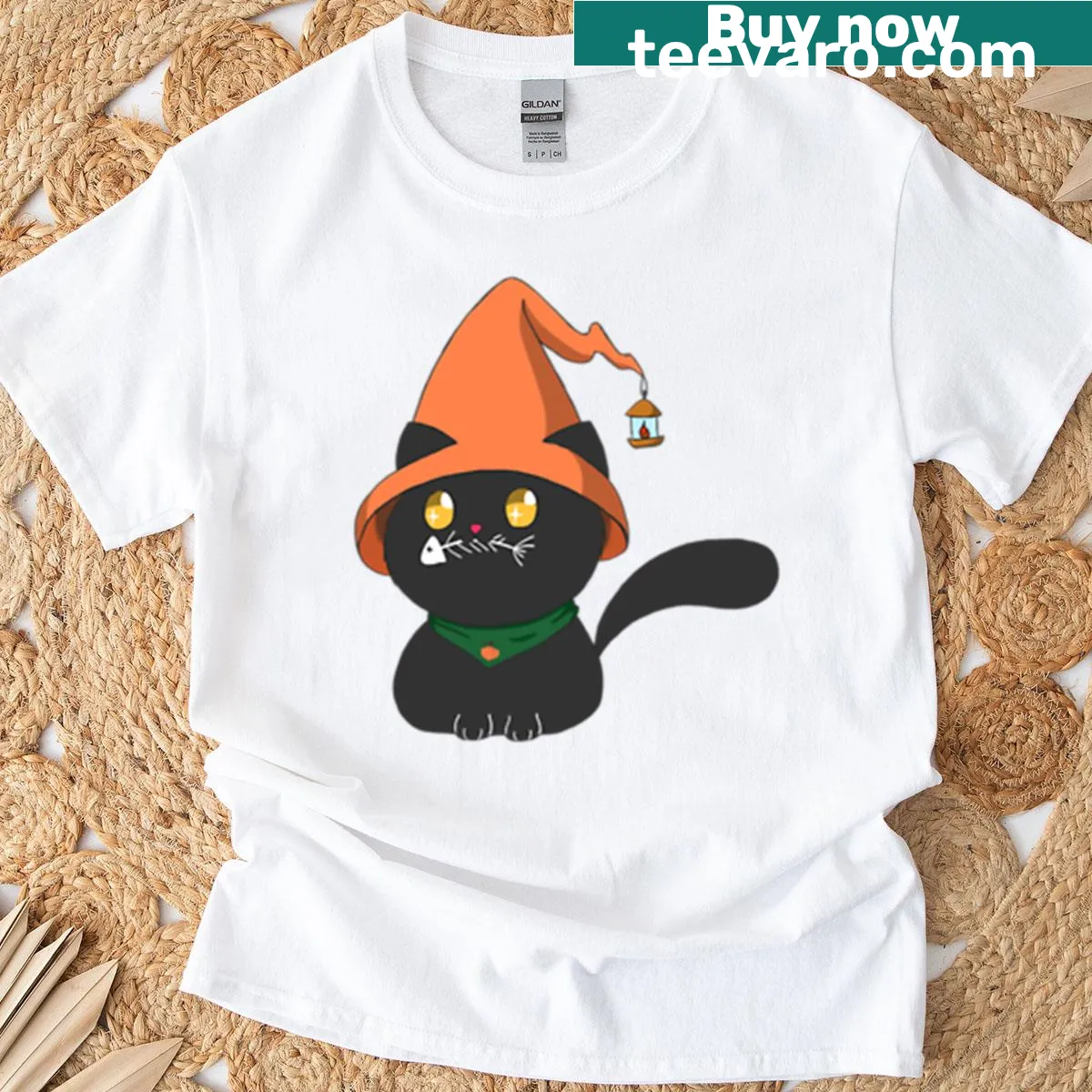 Cartoon cat with witch's hat on Halloween-themed T-shirt — on a men's t-shirt
