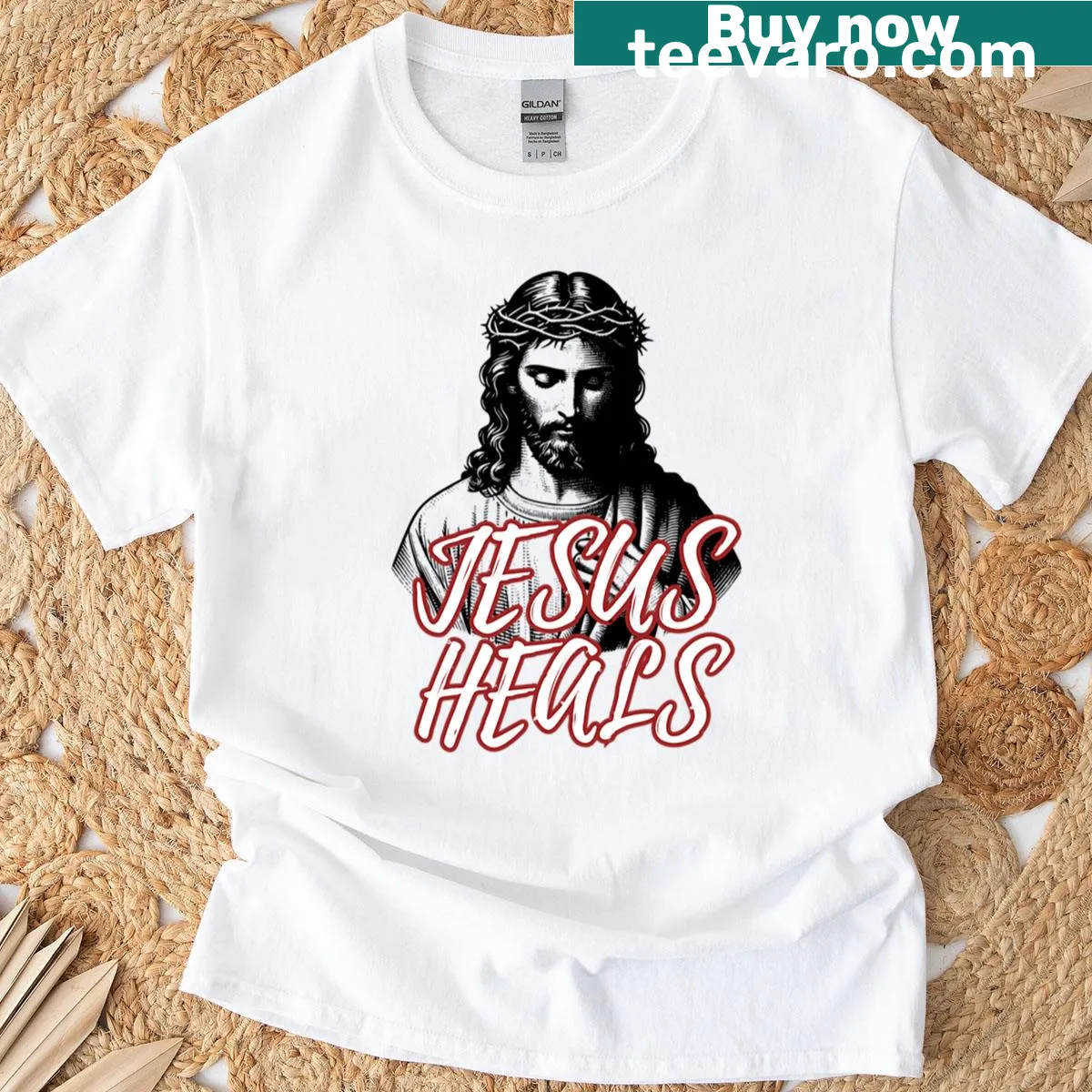 Typographic design featuring the phrase 'Jesus Heals' — on a men's t-shirt