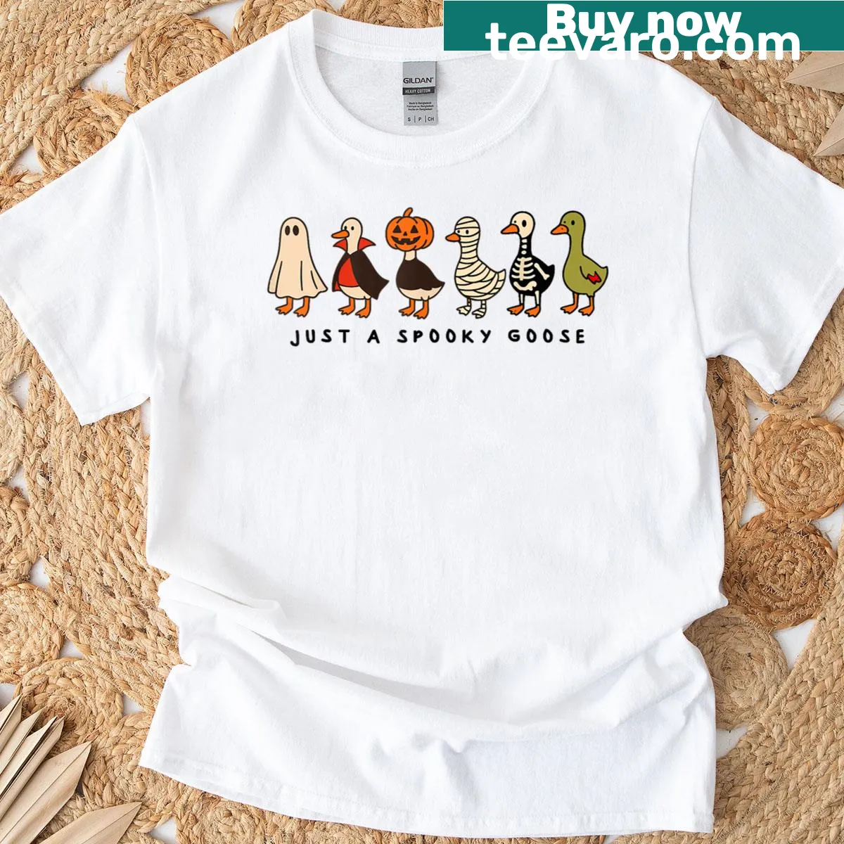 Silly Halloween T-shirt featuring cartoon goose with spooky vibes — on a men's t-shirt