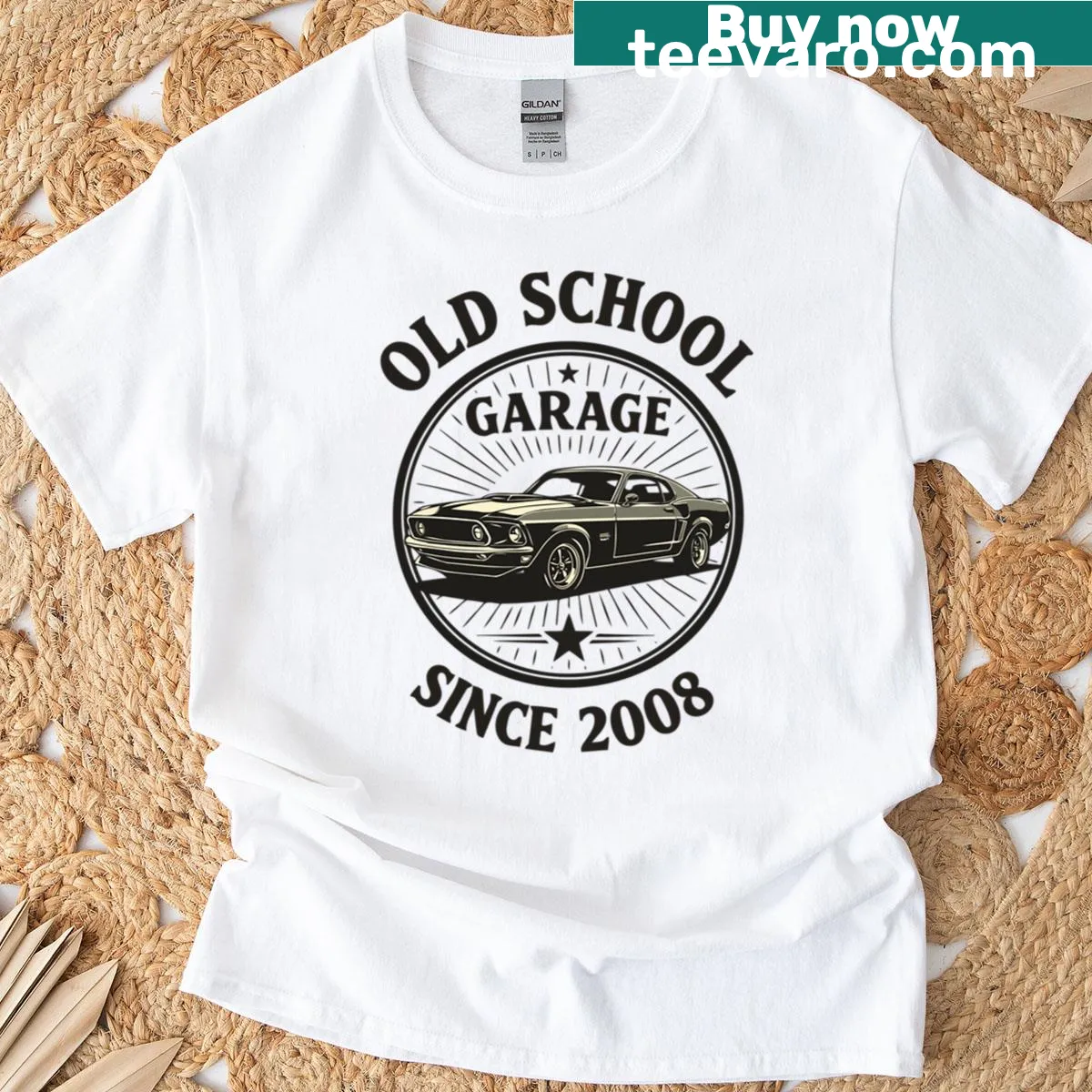 Vintage garage-themed t-shirt with automotive graphic — on a men's t-shirt