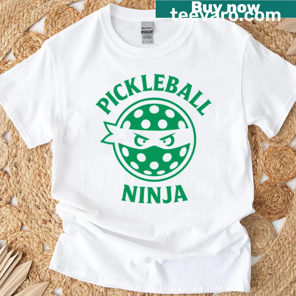 Funny pickleball ninja graphic t-shirt with bold logo — on a men's t-shirt