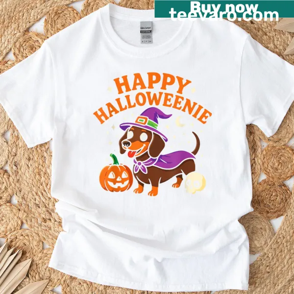 Cute Halloween t-shirt featuring a weiner dog in a witch costume