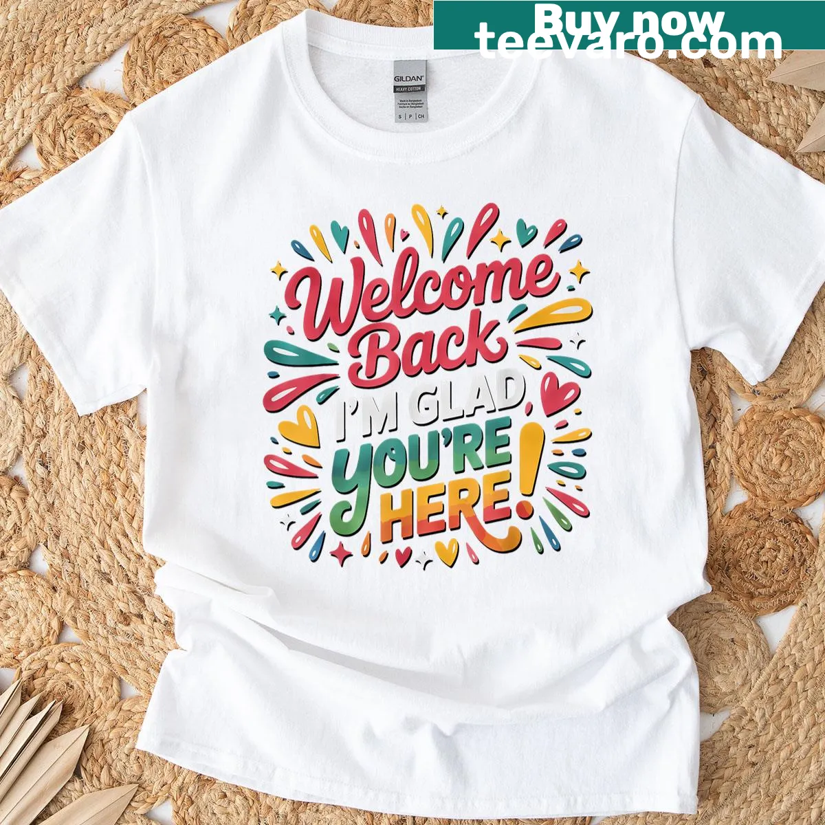 White shirt with welcoming back to school slogan in playful typography — on a men's t-shirt