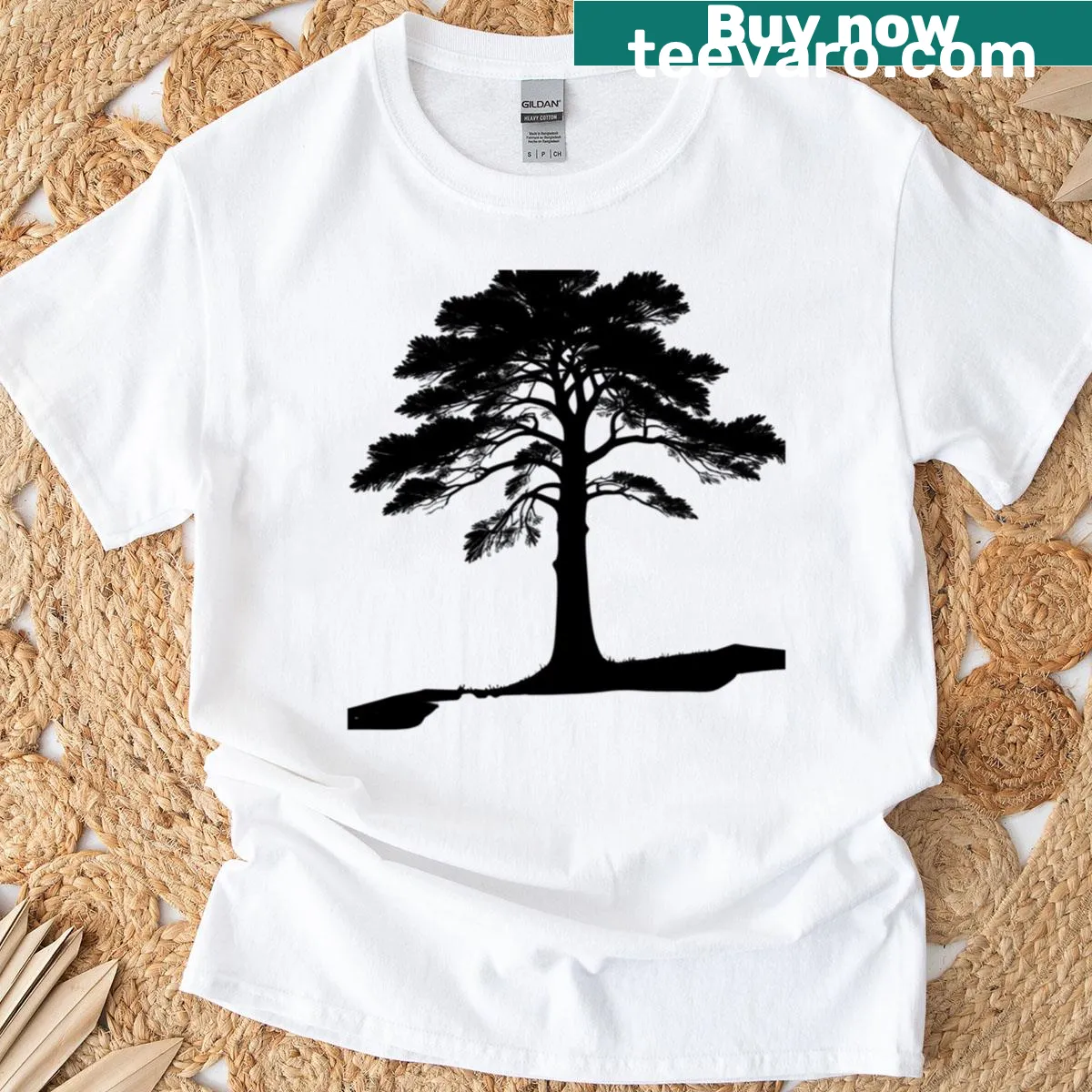 Silhouette illustration of a windswept pine tree on a premium t-shirt — on a men's t-shirt