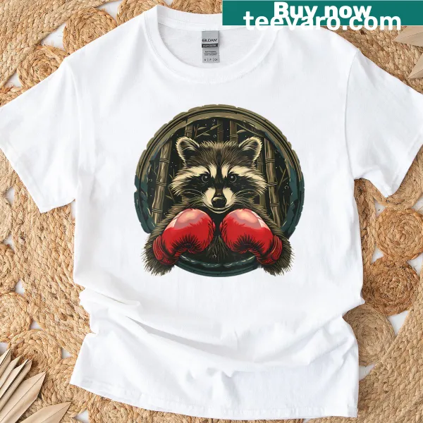 Funny raccoon in boxing gloves cartoon on a T-shirt.