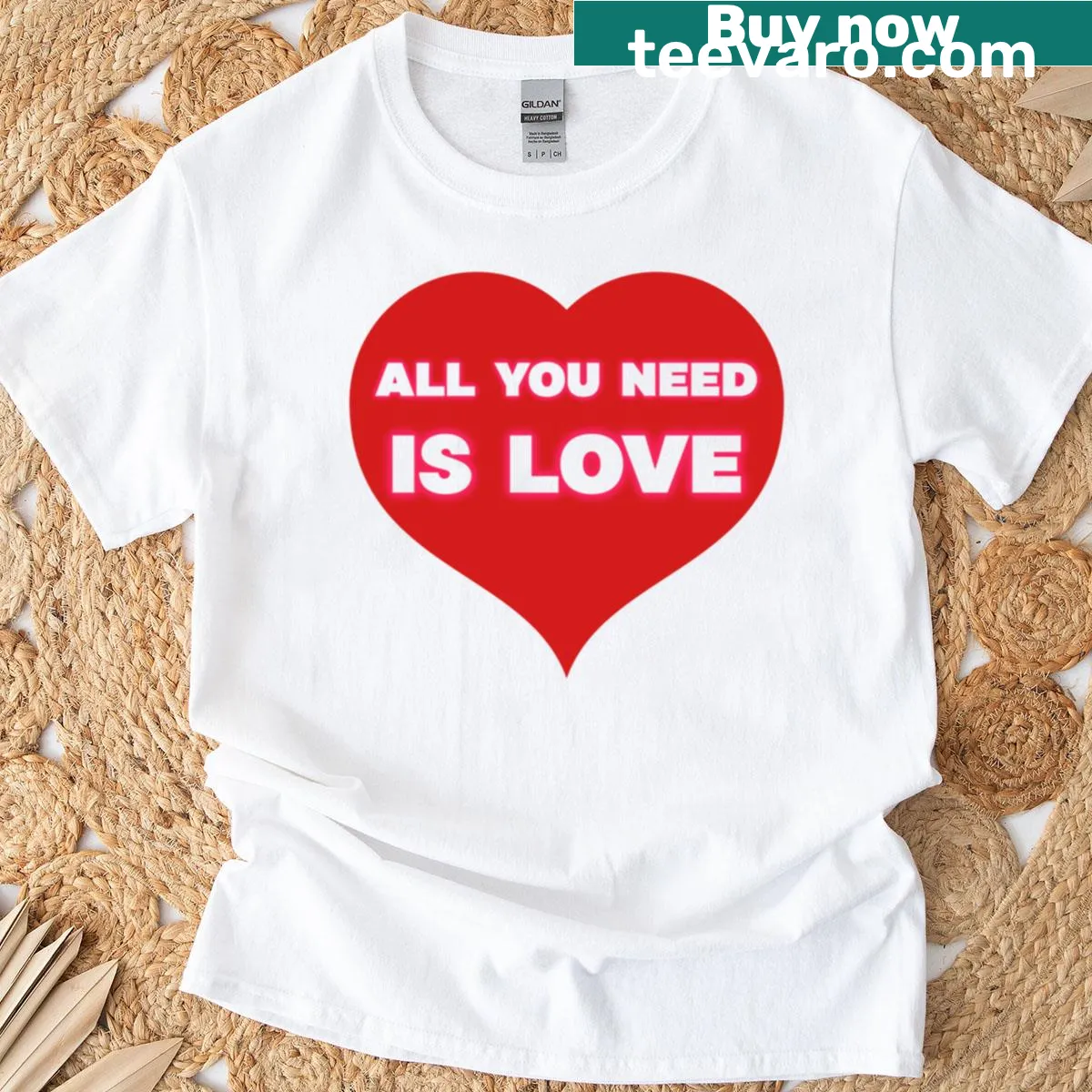Text design featuring the phrase 'All I Need Is Love' — on a men's t-shirt