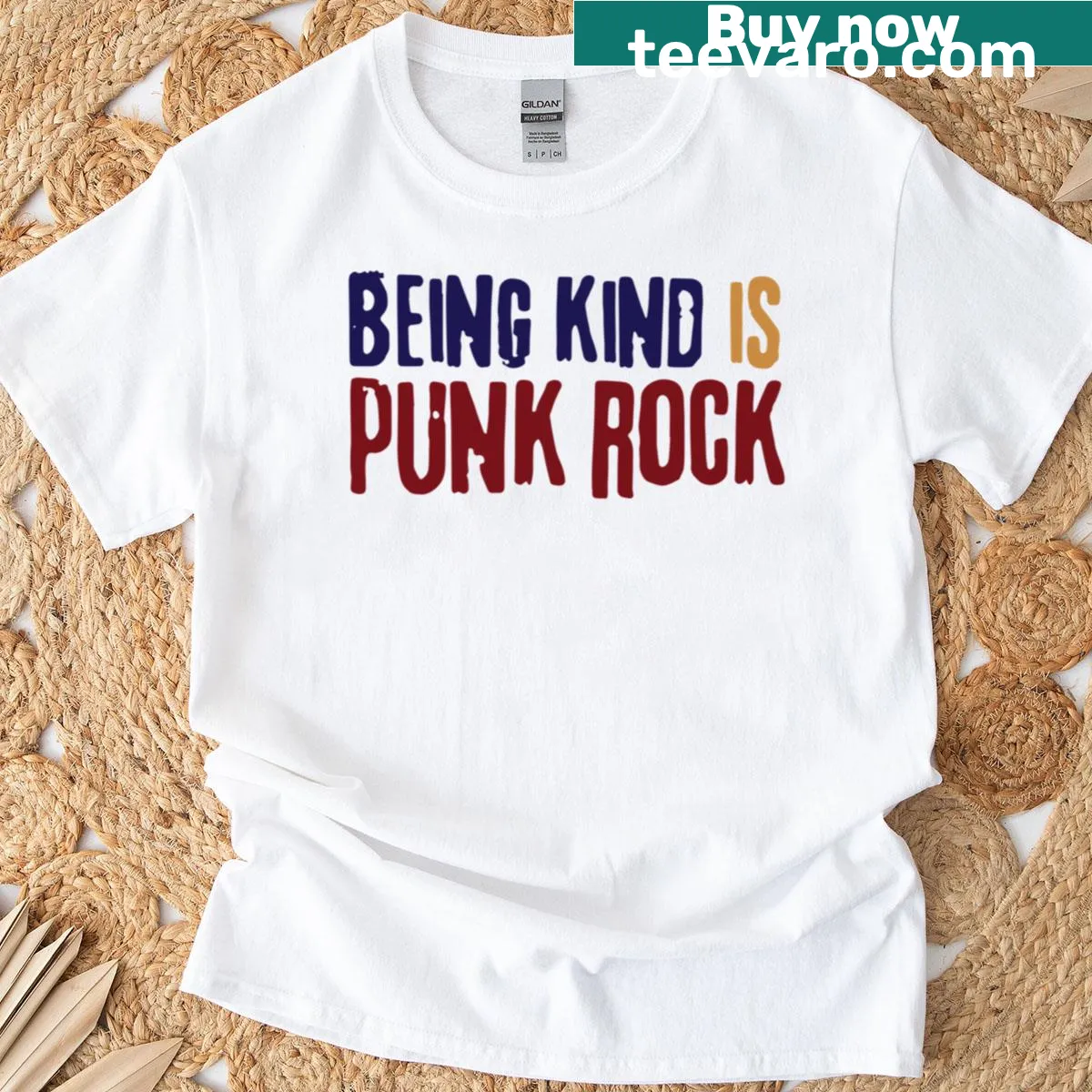Typographic T-shirt saying 'Being Kind Is Punk Rock' — on a men's t-shirt