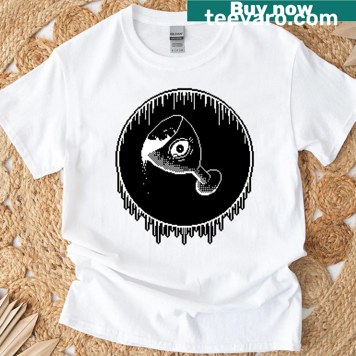 Stylized eye in a chalice graphic on a black and white T-shirt — on a men's t-shirt