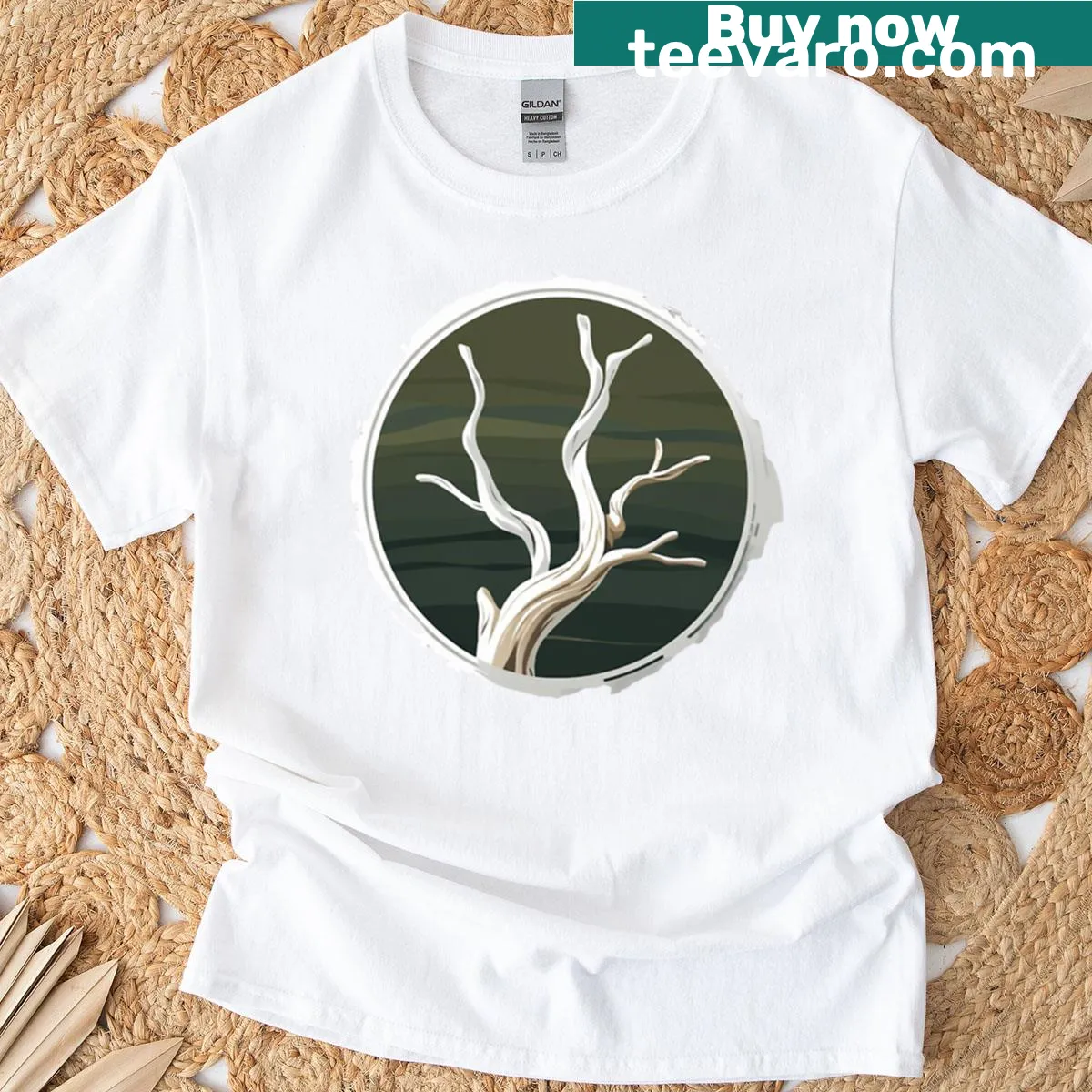 Minimalist driftwood tree graphic on a coastal-themed t-shirt. — on a men's t-shirt