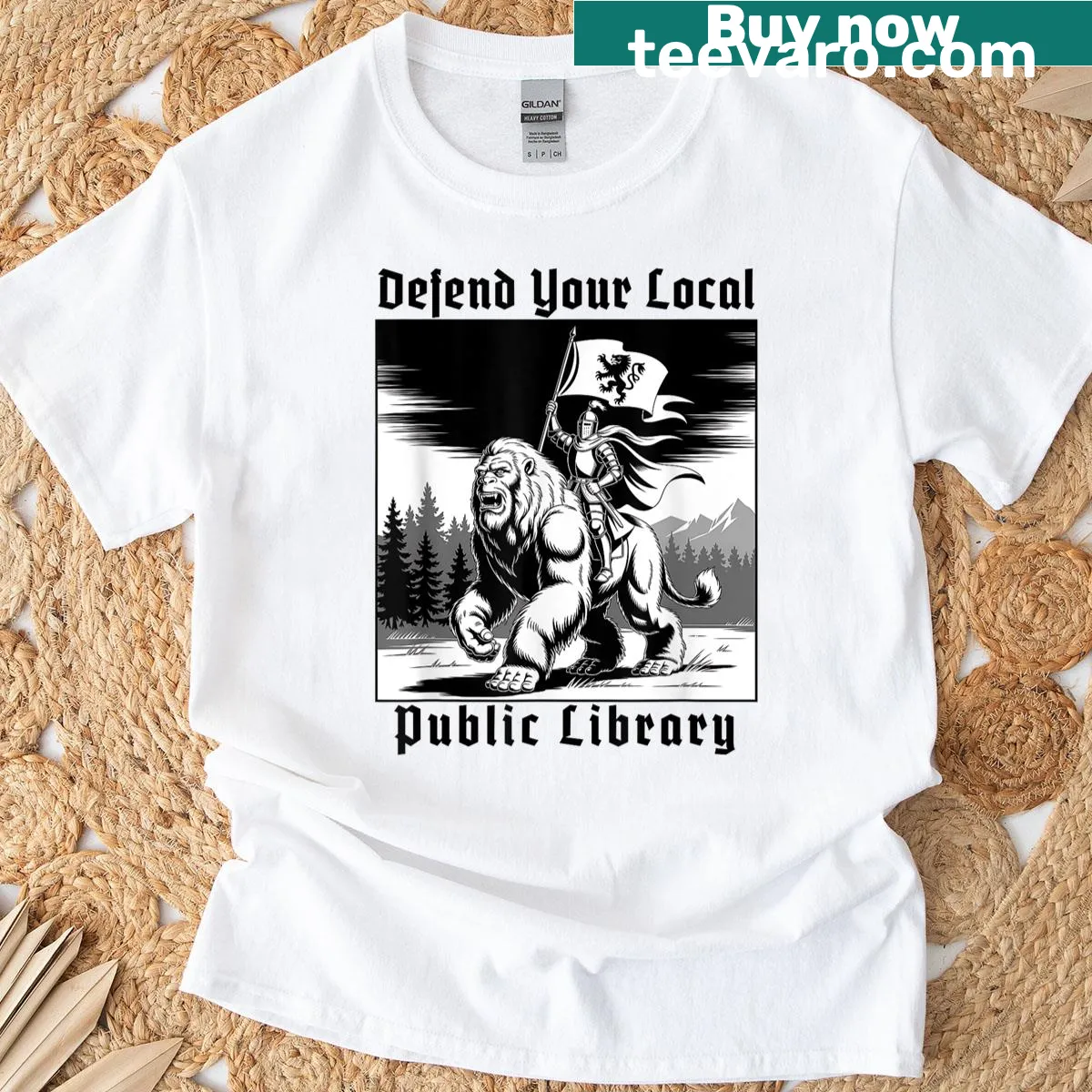 Playful graphic of a knight Bigfoot defending a library with a book — on a men's t-shirt