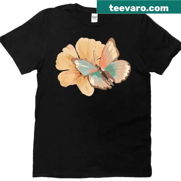 T-shirt with a watercolor design of a butterfly on a peach flower