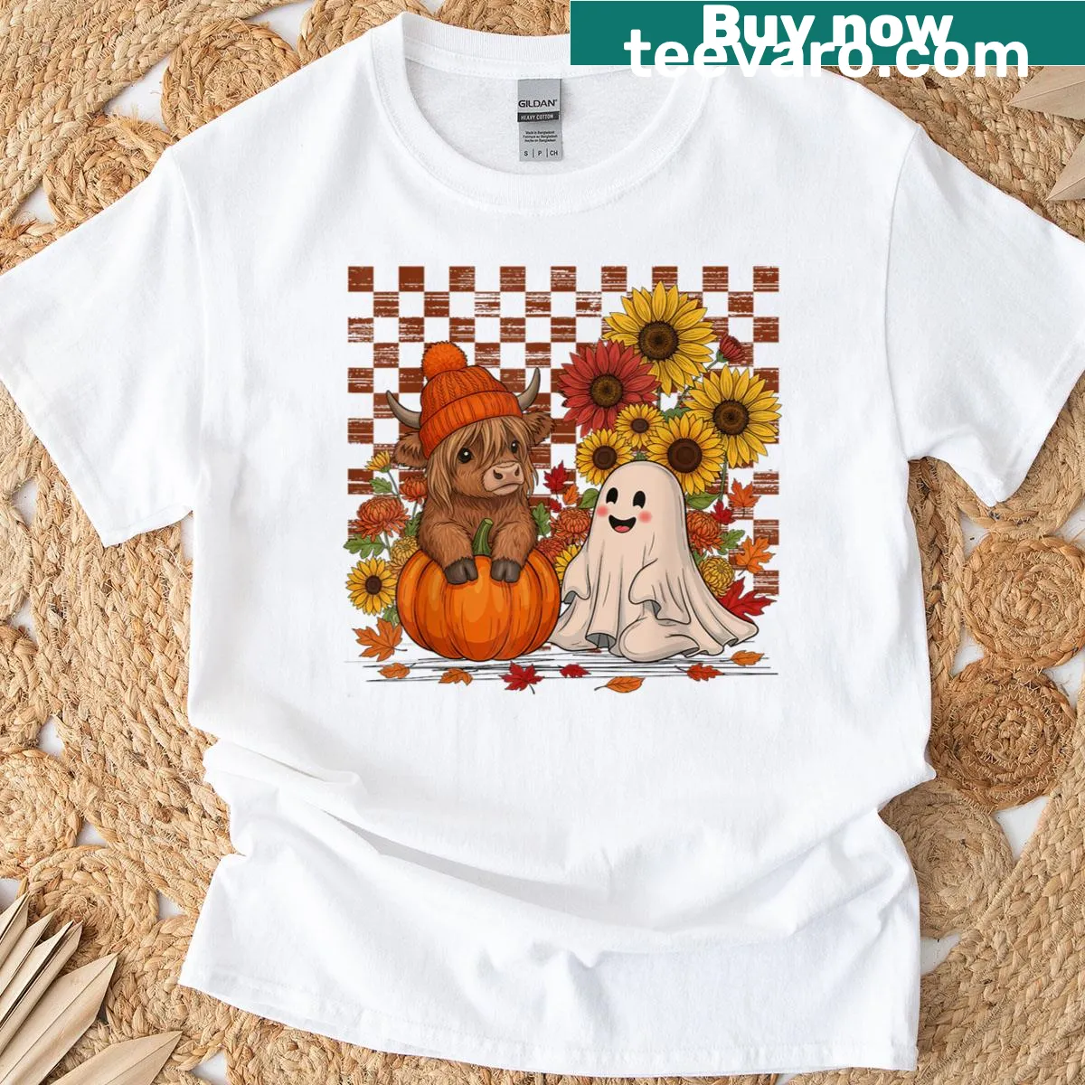 A Highland cow dressed as a ghost with pumpkins in a playful design. — on a men's t-shirt
