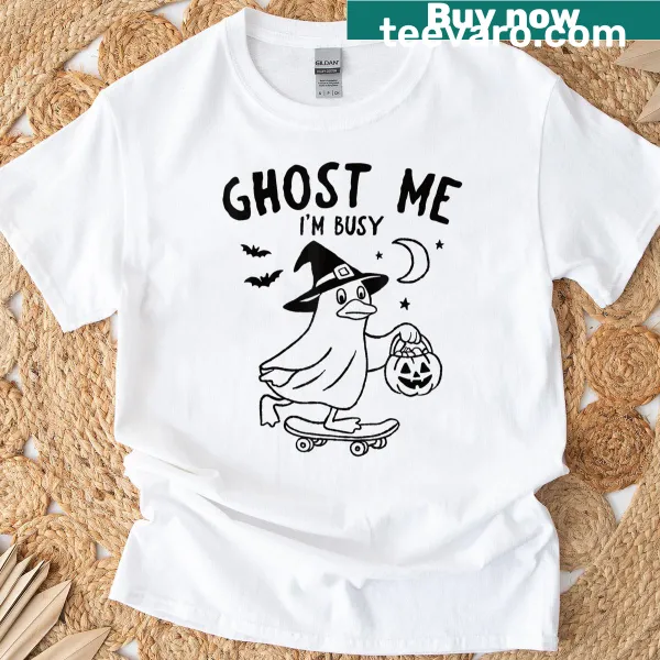 Cartoon Halloween T-shirt featuring a duck in a witch hat