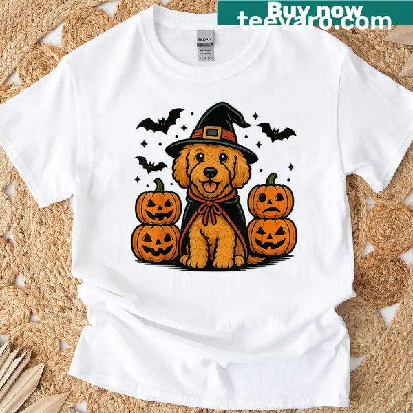Golden Doodle in Halloween attire with pumpkins and bats
