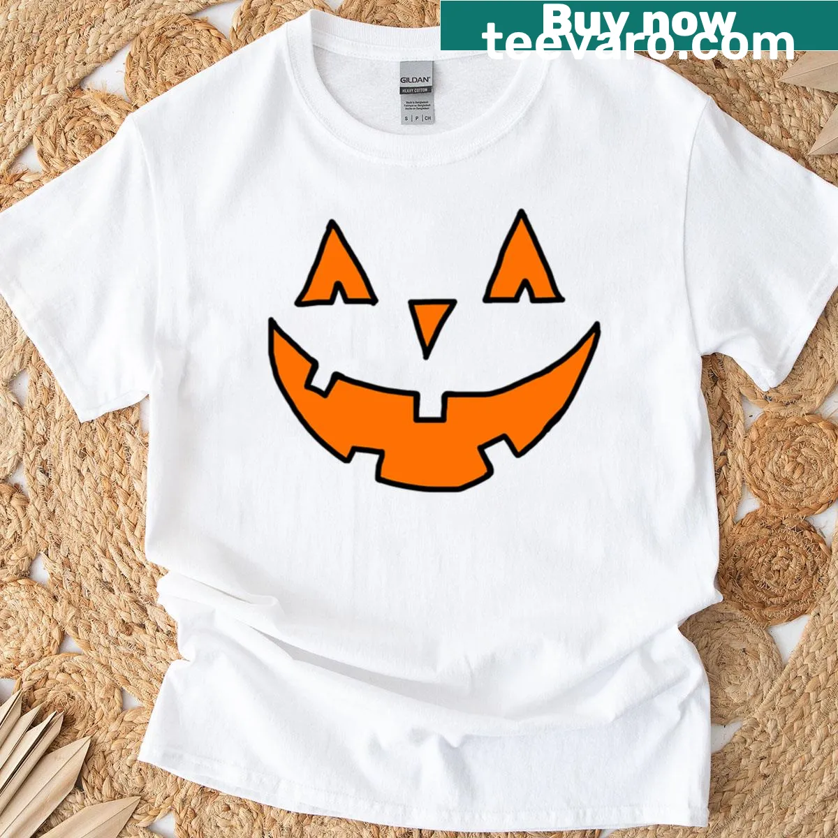 T-shirt featuring a cheerful Jack O Lantern graphic — on a men's t-shirt