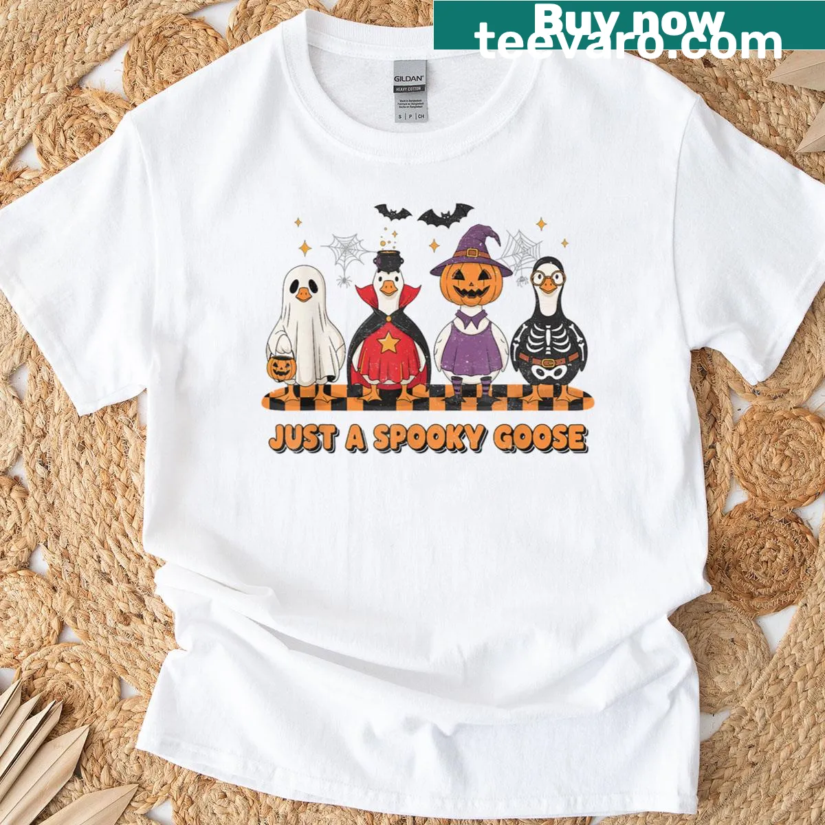 Cartoon Halloween t-shirt featuring spooky characters like vampire and ghost. — on a men's t-shirt