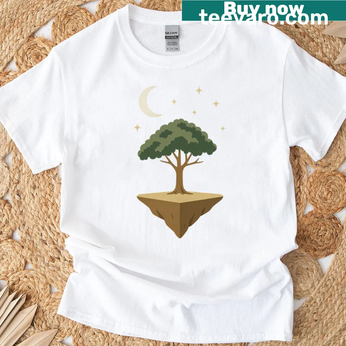 Nature-themed t-shirt featuring a serene island and moon design. — on a men's t-shirt