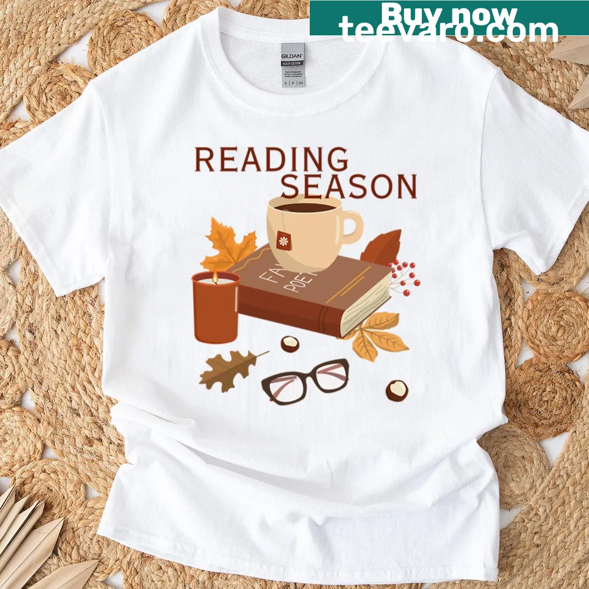 Cozy autumn-themed graphic illustrating reading on t-shirt — on a men's t-shirt