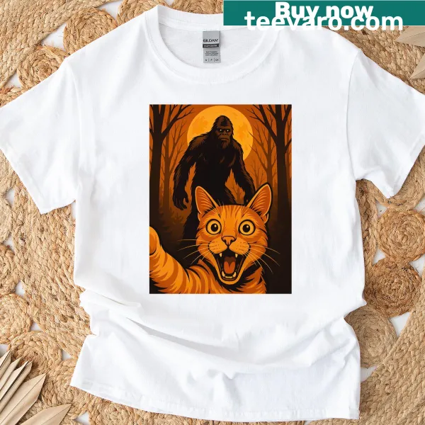 T-shirt featuring a scared cat selfie with zombie Bigfoot.