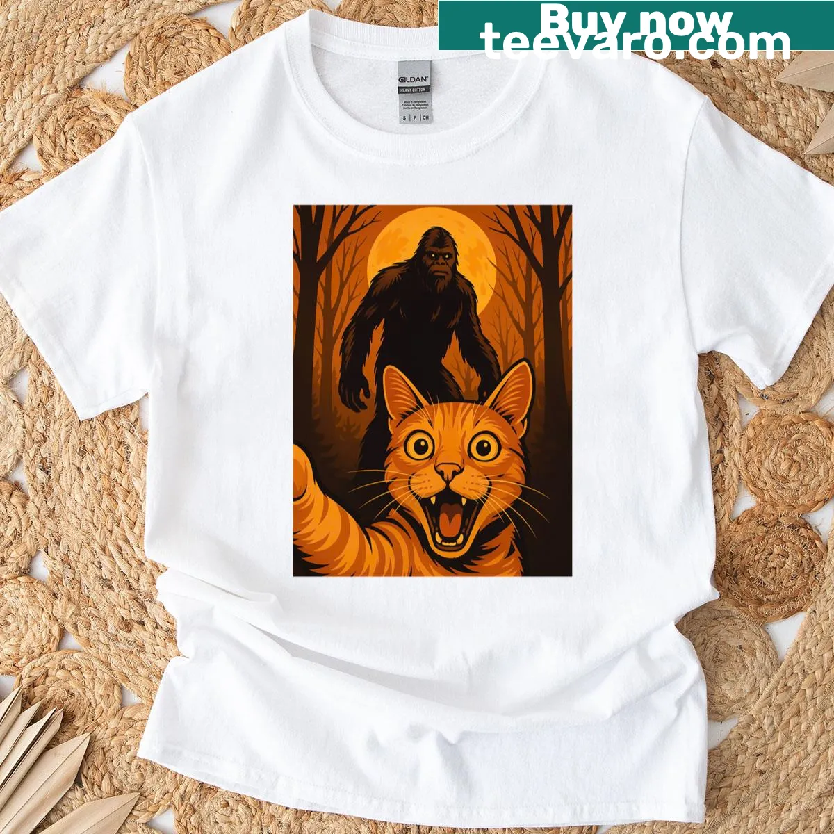 T-shirt featuring a scared cat selfie with zombie Bigfoot. — on a men's t-shirt