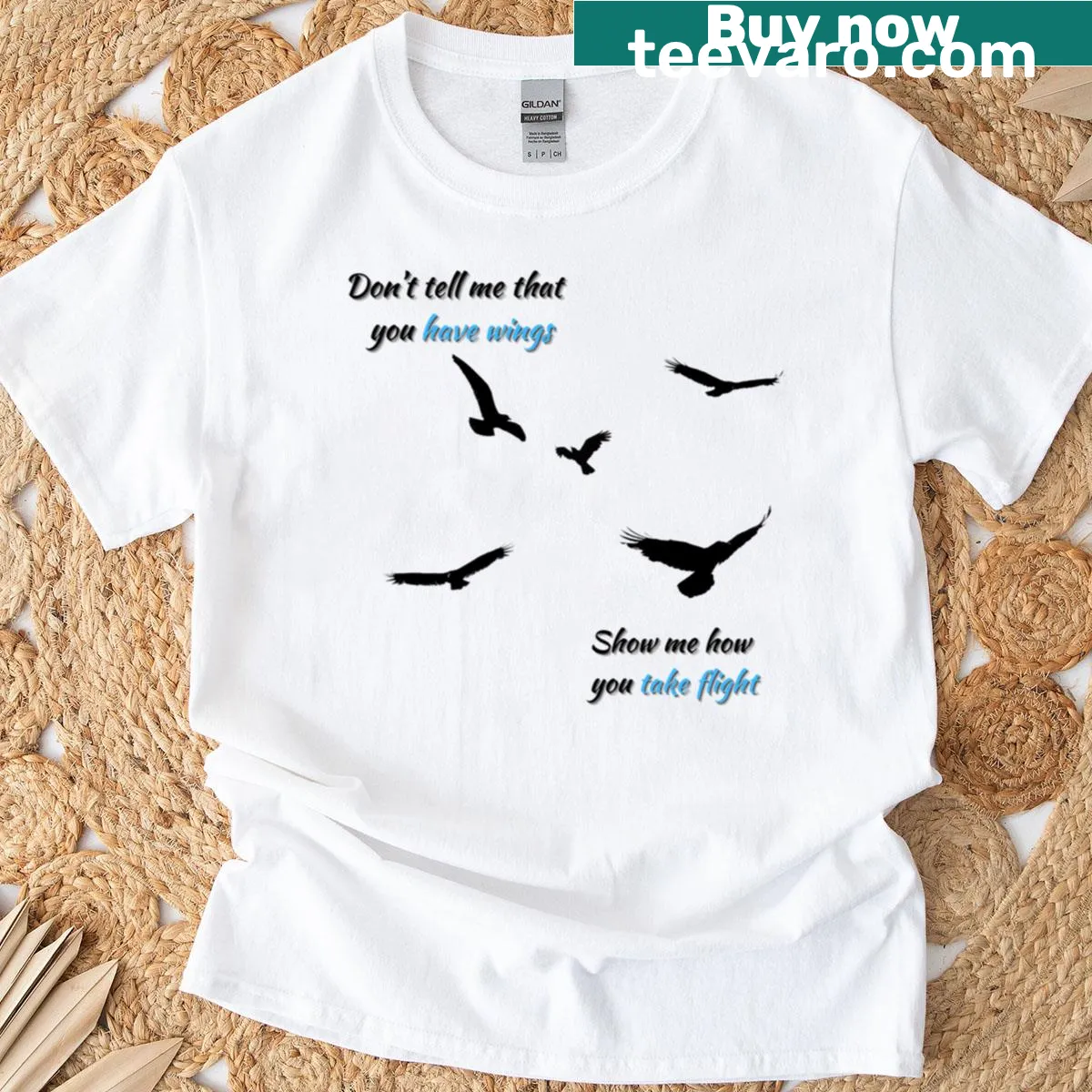 Inspirational T-shirt with the phrase 'Show Me How You Take Flight' in elegant typography. — on a men's t-shirt