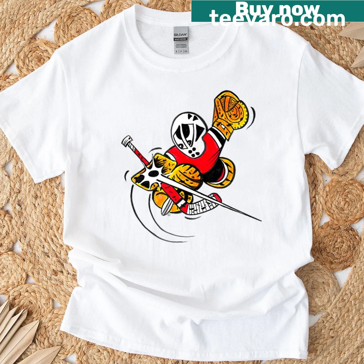Cartoon T-shirt featuring a goalie making a save in hockey — on a men's t-shirt