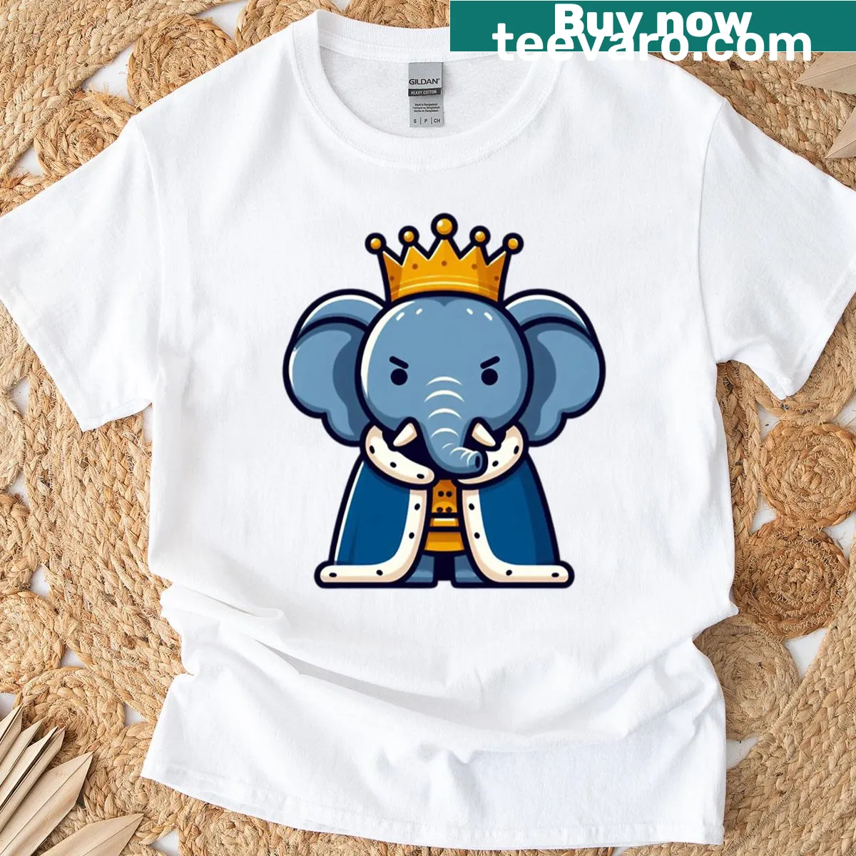 Cartoon illustration of a crowned elephant king wearing a royal cape on T-shirt. — on a men's t-shirt