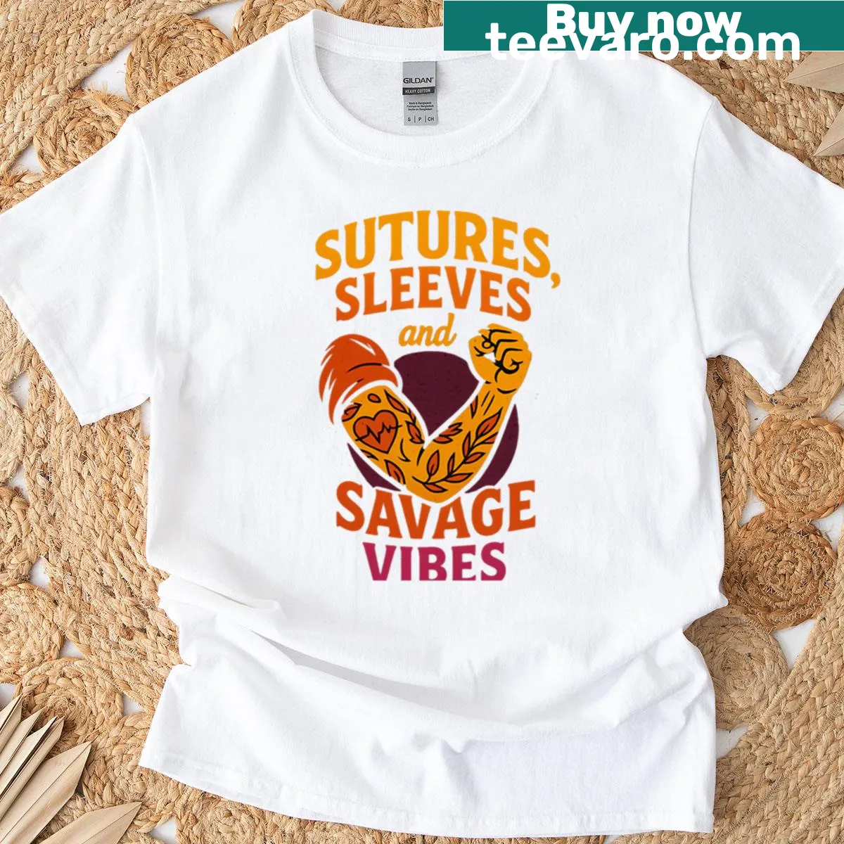 Typography reading 'Sutures Sleeves And Savage Vibes' on T-shirt — on a men's t-shirt