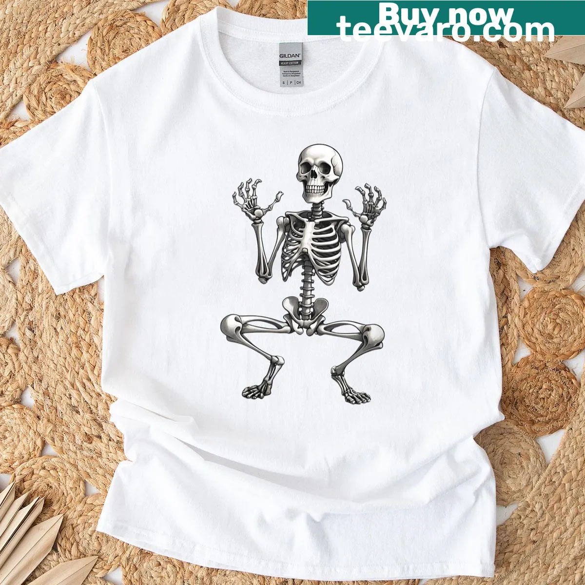 Hand-lettered graphic with a skeleton saying 'I’m just here for the boos' — on a men's t-shirt