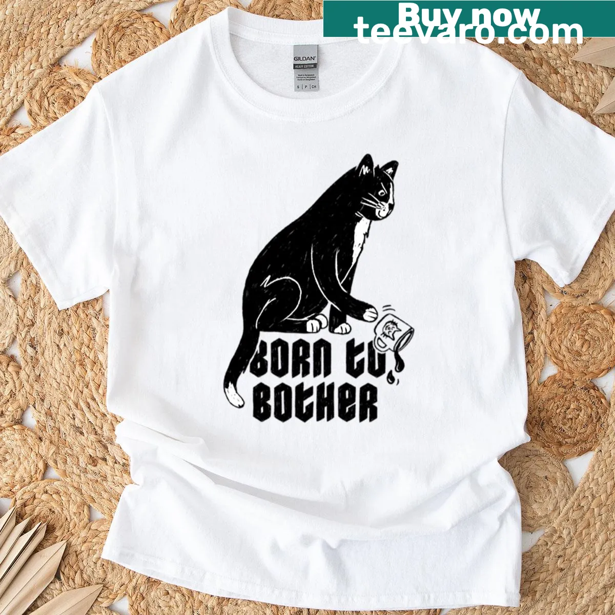 Playful cat graphic T-shirt with text 'Born To Bother' — on a men's t-shirt