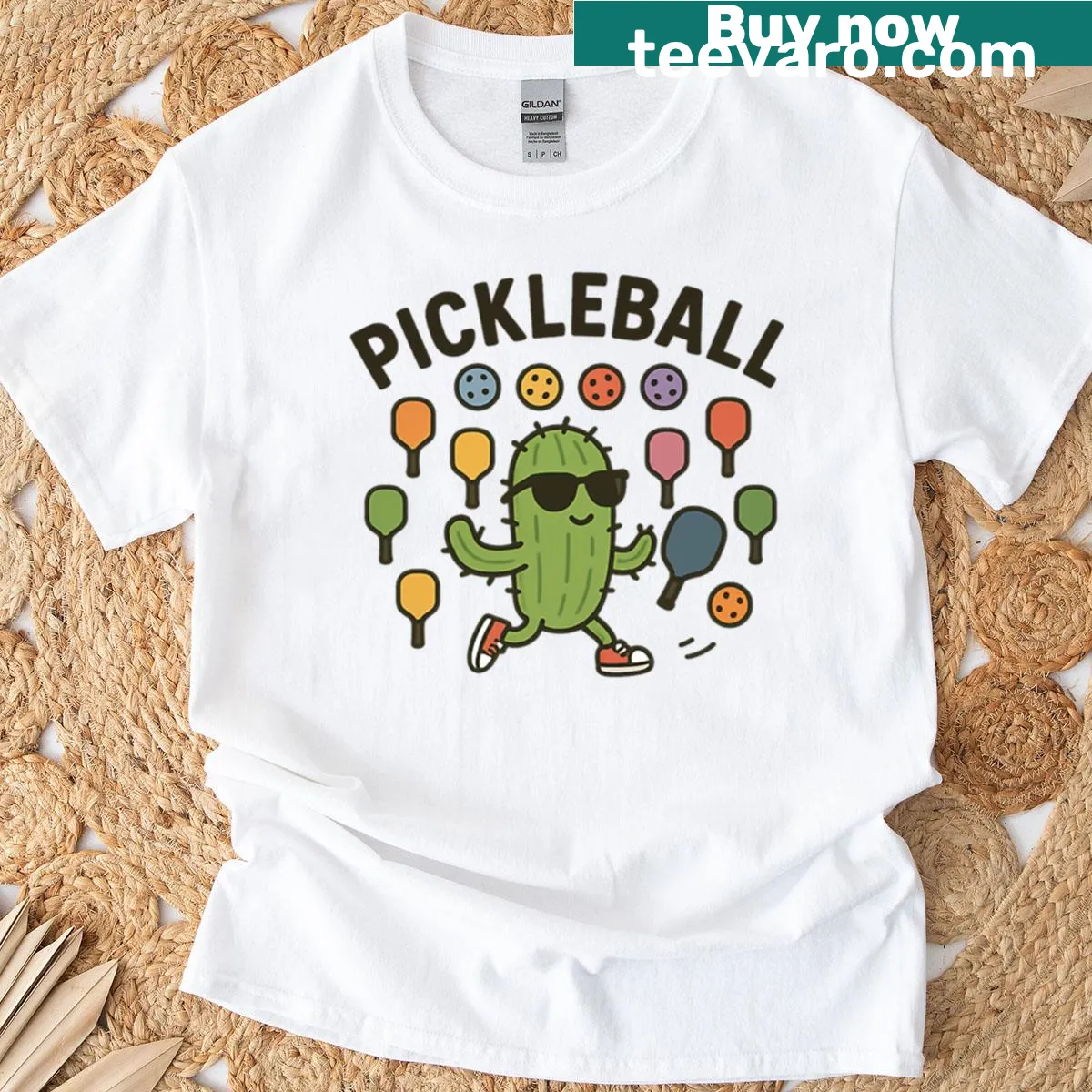 Cartoon pickleball paddles and cacti design on a t-shirt — on a men's t-shirt