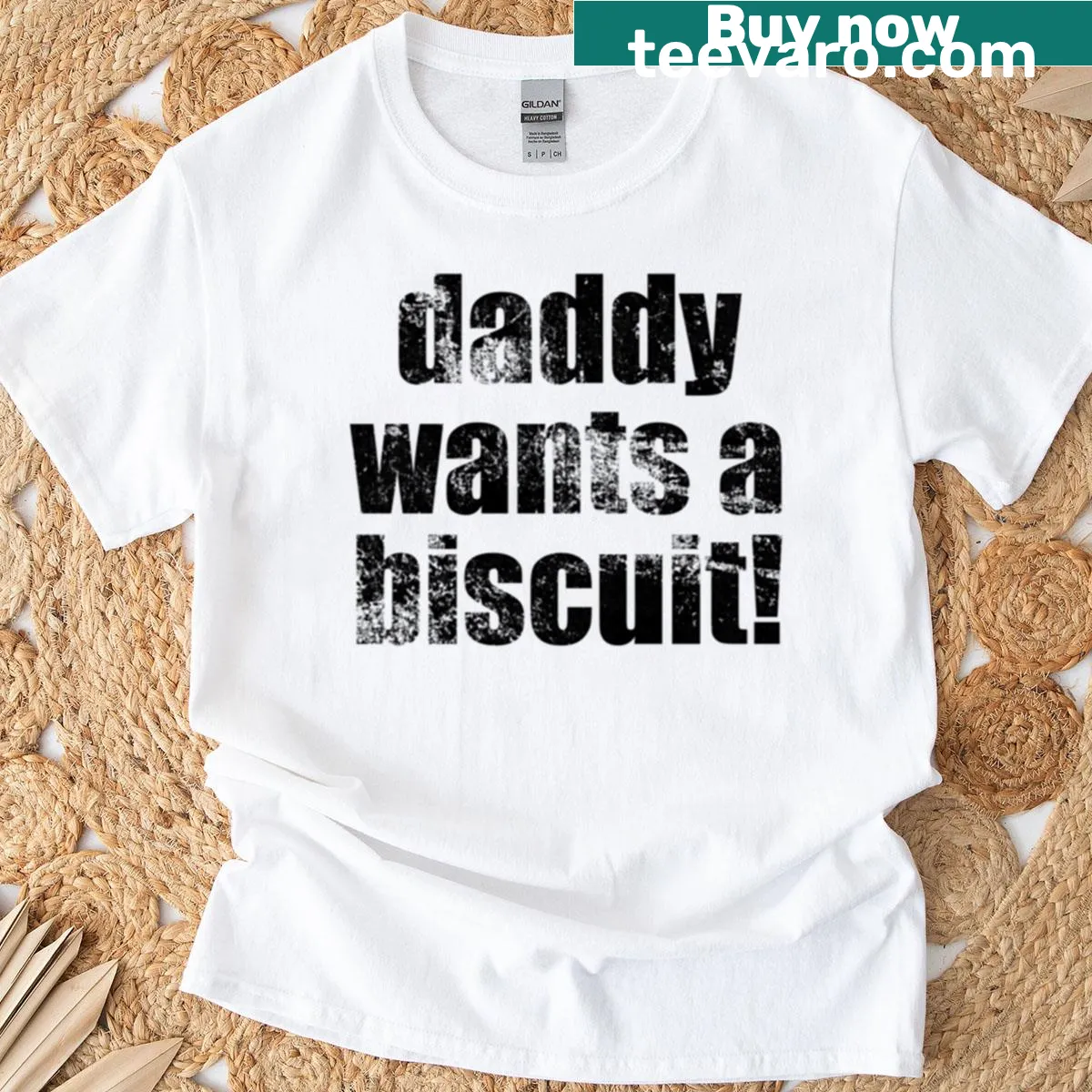 Distressed text design reading 'Daddy Wants A Biscuit' on a t-shirt — on a men's t-shirt