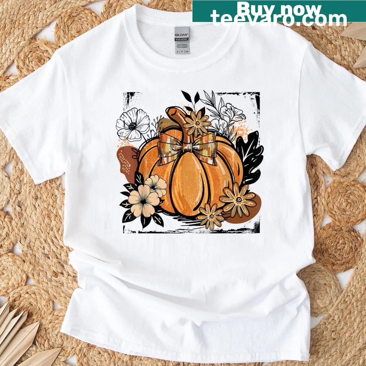 Vintage-style T-shirt with coquette bow and pumpkin design — on a men's t-shirt